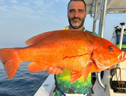 Angler with red emperor — Ras Al Khaimah